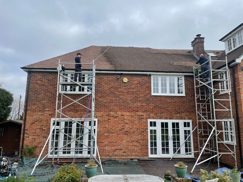 Roof cleaning carried out safely from scaffold towers by The Roof Moss Cleaners in Redbourn